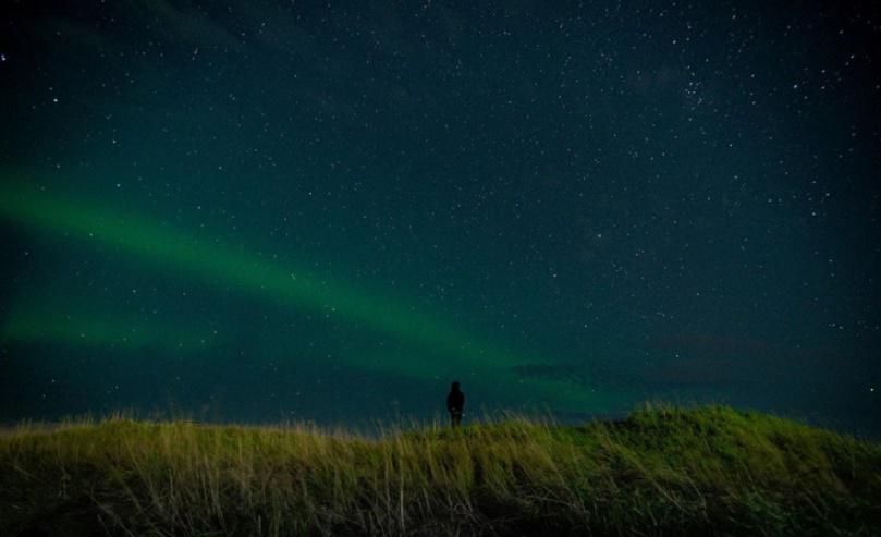 Northern lights on Viðey Island and my little one Photo by Brandon Sheppard